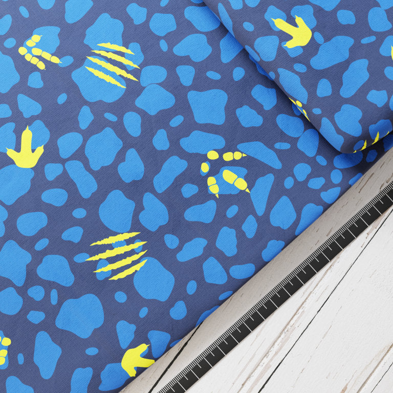 Baumwollsatin: Dino Spuren - perfekt für Schultüten, Accessoires zur Einschulung - Tyrannosaurus, T-Rex, Dinosaurier, Blau, Gelb